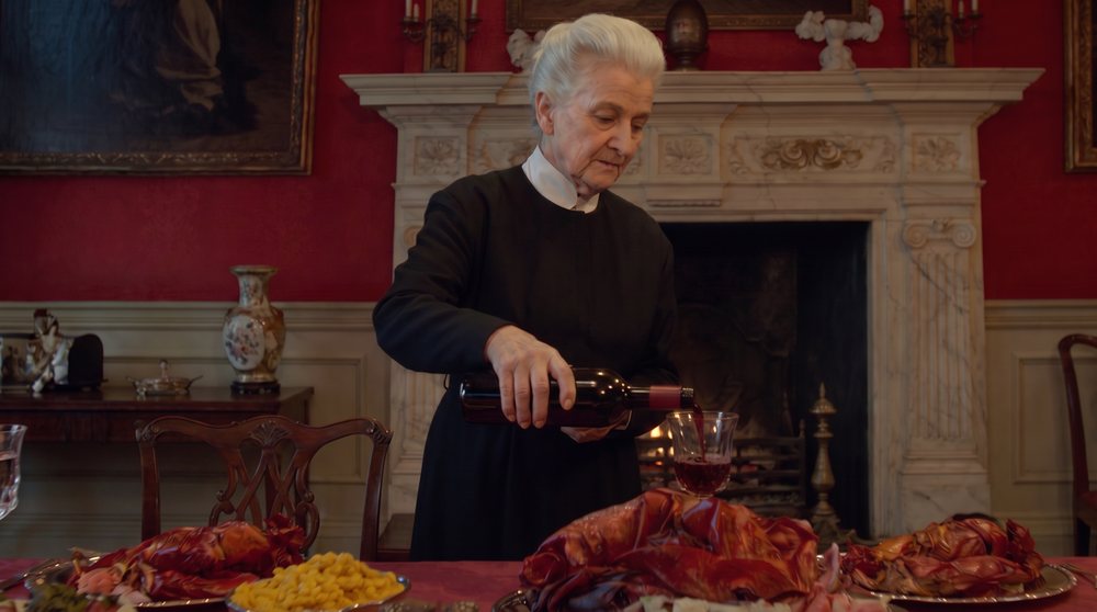 AI edit: a feast and red tablecloth added, the frame brighter and more saturated